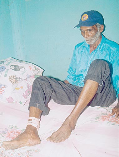  Mohammed Asgar Alli, the dead woman's husband who was shot in the foot.